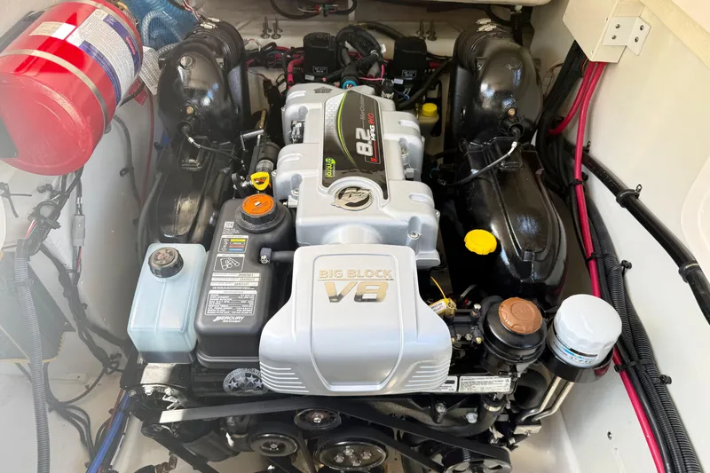 Slide: The Image of Engine compartment of 2025 Sea Ray SLX 280 with Big Block V8 engine. - 30
