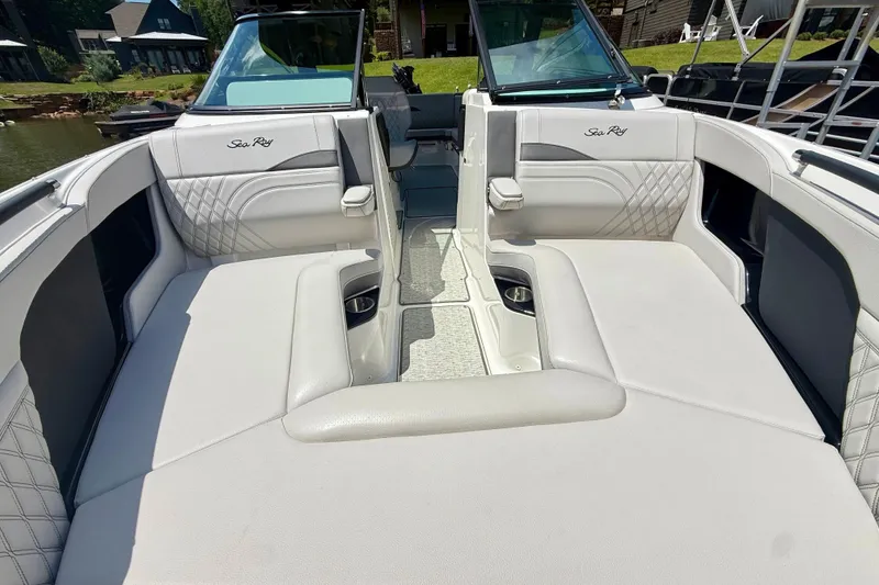 Slide: The Image of Luxurious interior of 2025 Sea Ray SLX 280 boat with plush seating and elegant design. - 23
