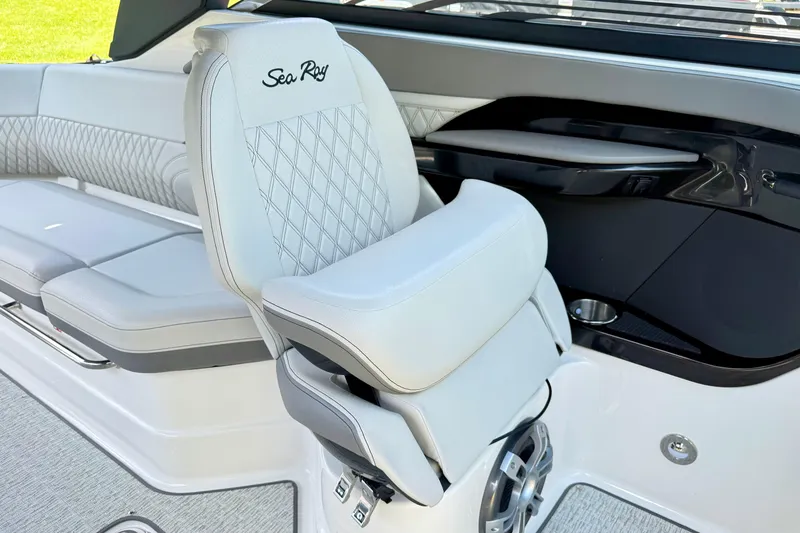 Slide: The Image of Luxurious interior of 2025 Sea Ray SLX 280 boat with elegant seating design. - 18