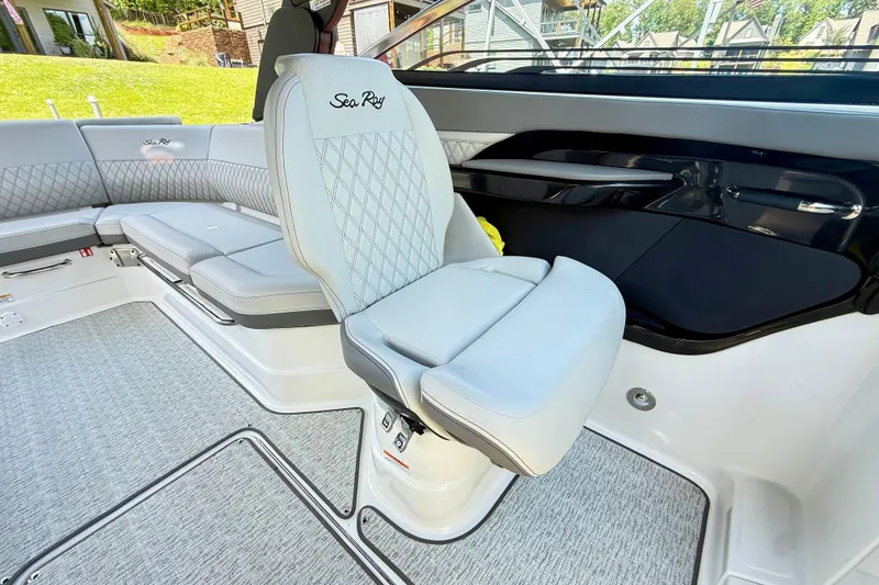 Slide: The Image of 2025 Sea Ray SLX 280 boat interior with luxurious seating and modern design. - 17