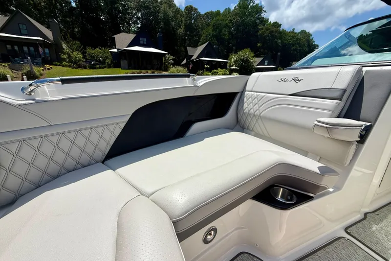 Slide: The Image of Luxurious interior seating of 2025 Sea Ray SLX 280 boat with elegant design. - 21