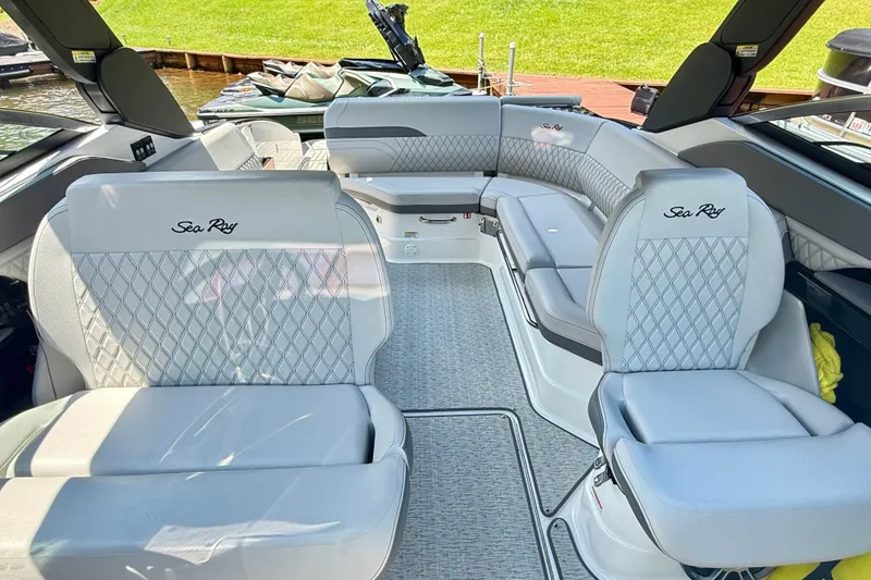 Slide: The Image of Luxurious interior of 2025 Sea Ray SLX 280 boat with elegant seating and modern design. - 24