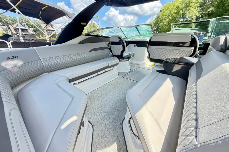 Slide: The Image of Luxurious interior of 2025 Sea Ray SLX 280 boat with elegant seating and modern design. - 10