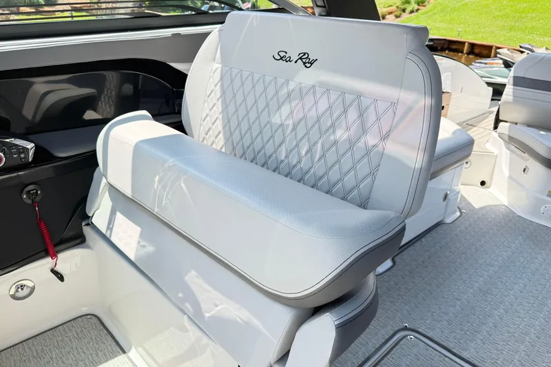 Slide: The Image of Luxurious seating on 2025 Sea Ray SLX 280 boat, featuring elegant diamond stitching. - 14