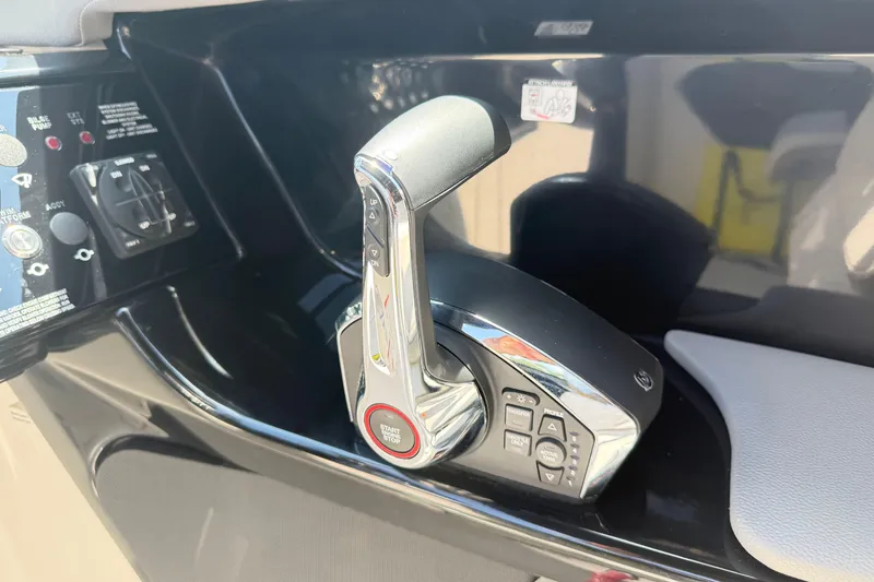 Slide: The Image of 2025 Sea Ray SLX 280 throttle control, featuring sleek design and advanced functionality. - 16