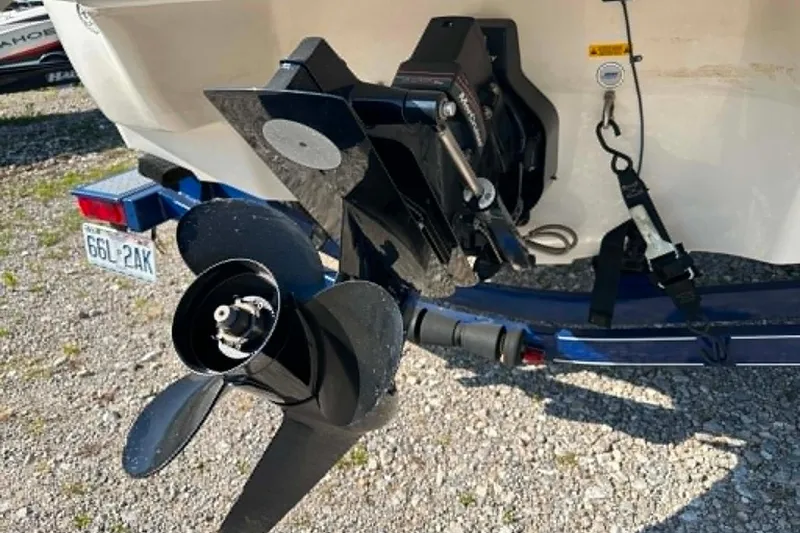 Slide: The Image of Rear view of a 2006 Tahoe Q6 Sport boat with propeller and trailer. - 9