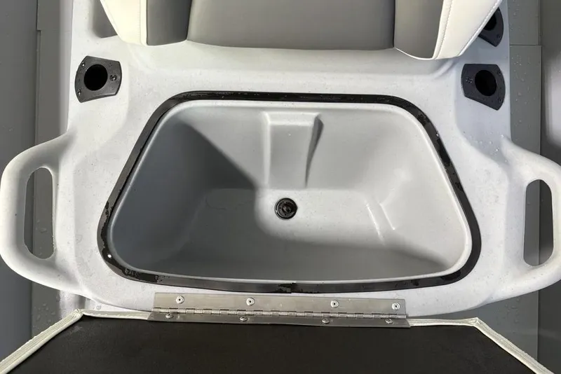 Slide: The Image of 2026 Tracker Bass Tracker Classic CC boat storage compartment, open and empty. - 9