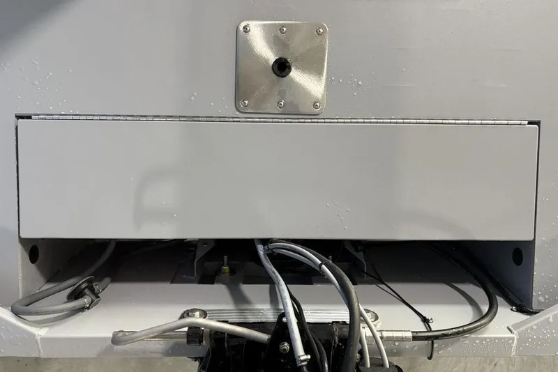 Slide: The Image of 2026 Tracker Bass Tracker Classic CC boat transom with cables and fittings. - 22