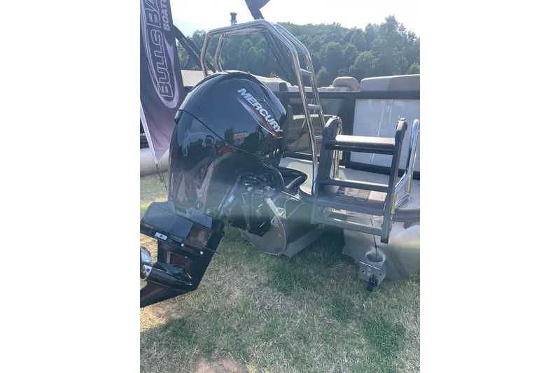 Slide: The Image of 2026 Alera A22 boat with Mercury outboard motor and ladder, displayed outdoors. - 3