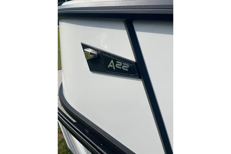 Slide: The Image of Close-up of 2026 Alera A22 boat emblem on sleek white surface. - 5