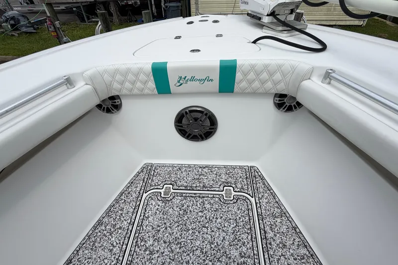 Slide: The Image of 2002 Yellowfin 31 Center Console boat interior with custom upholstery and marine speakers. - 35