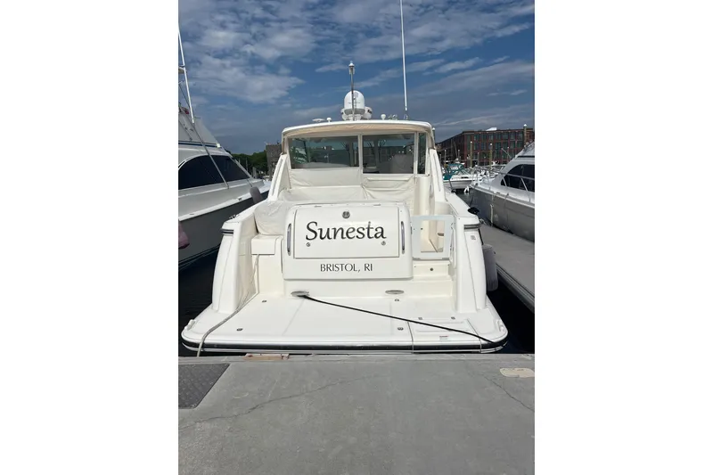 Slide: The Image of 2012 Tiara Yachts 3900 Sovran docked, rear view with clear skies. - 10