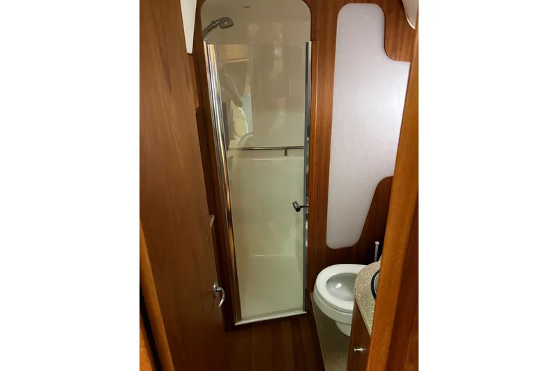 Slide: The Image of Bathroom interior of 2012 Tiara Yachts 3900 Sovran with shower and toilet. - 41