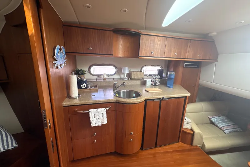 Slide: The Image of Luxurious 2012 Tiara Yachts 3900 Sovran interior with elegant wood cabinetry and modern amenities. - 30