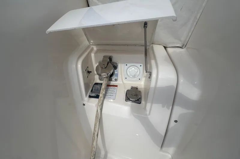 Slide: The Image of Fuel and water access panel on a 2012 Tiara Yachts 3900 Sovran. - 19