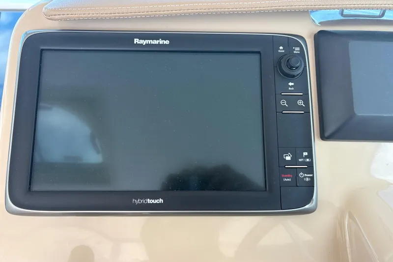 Slide: The Image of Raymarine HybridTouch display on 2012 Tiara Yachts 3900 Sovran dashboard. - 16