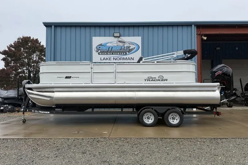 The Image of 2026 Sun Tracker Party Barge 22 DLX pontoon boat at Lake Norman dealership. - 2