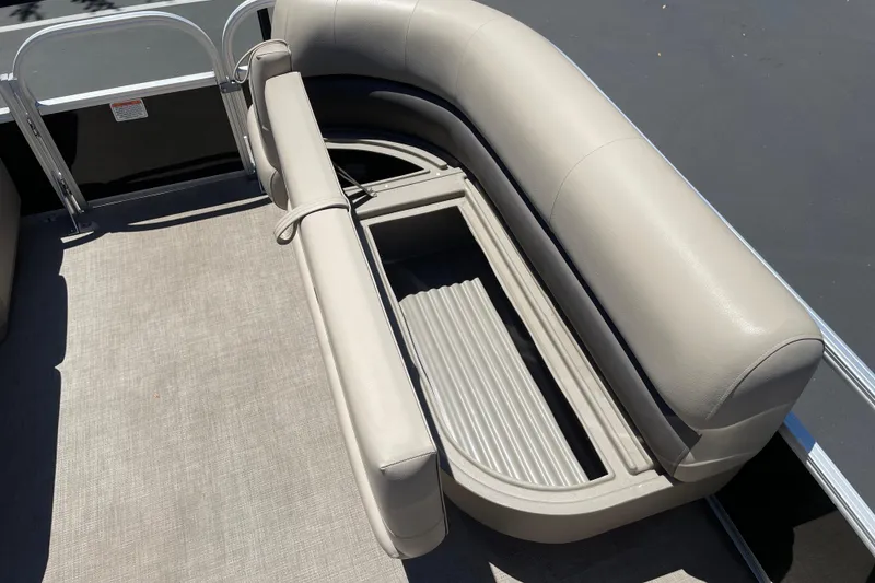 Slide: The Image of 2025 Sun Tracker Party Barge 16 DLX pontoon seating with storage compartment. - 8