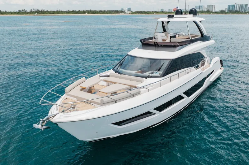 Slide: The Image of 2025 Ferretti Yachts 670 cruising on open water, showcasing sleek design and luxury features. - 28