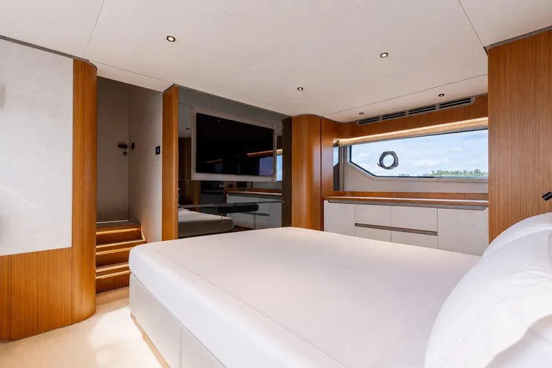 Slide: The Image of Luxurious interior of 2025 Ferretti Yachts 670, featuring elegant wood finishes and modern design. - 16