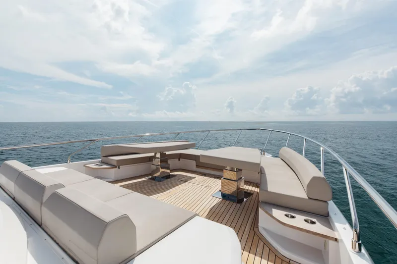 Slide: The Image of Luxurious deck of 2025 Ferretti Yachts 670, featuring elegant seating and ocean views. - 26