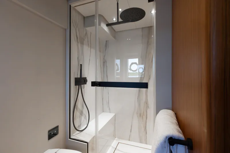 Slide: The Image of Luxurious bathroom in 2025 Ferretti Yachts 670, featuring modern shower design and elegant finishes. - 19
