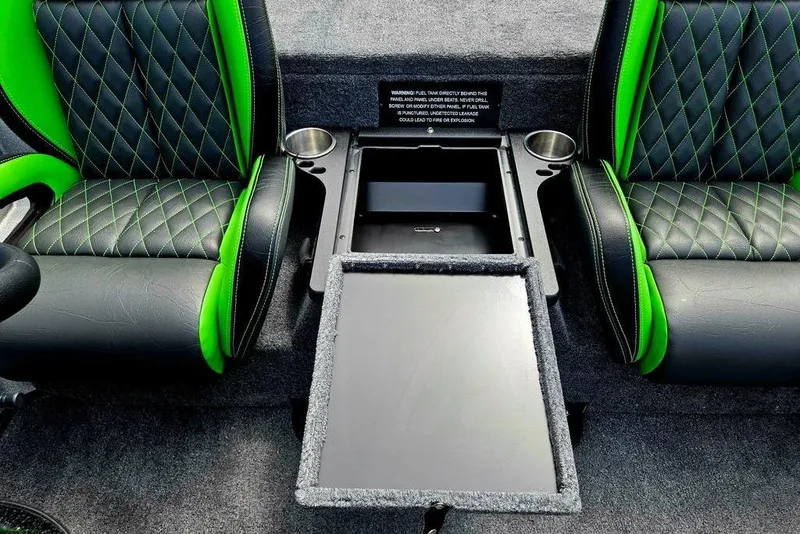Slide: The Image of 2027 Phoenix 721 ZXL interior with green-accented seats and center console storage. - 40