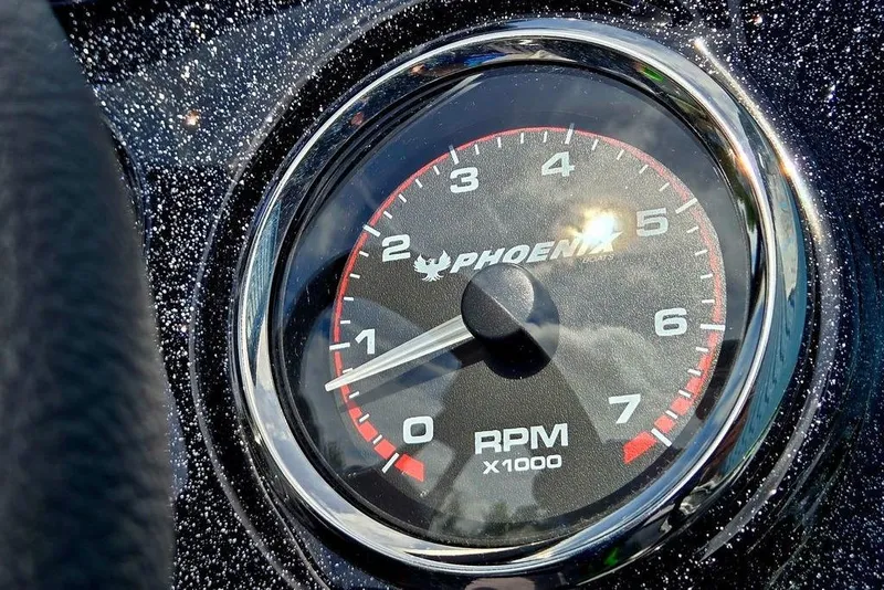 Slide: The Image of Close-up of 2027 Phoenix 721 ZXL tachometer, displaying RPM gauge. - 44