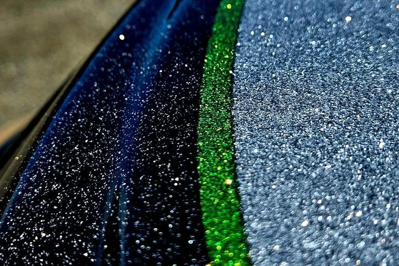 Slide: The Image of Close-up of 2027 Phoenix 721 ZXL car paint with glittering blue and green stripes. - 16
