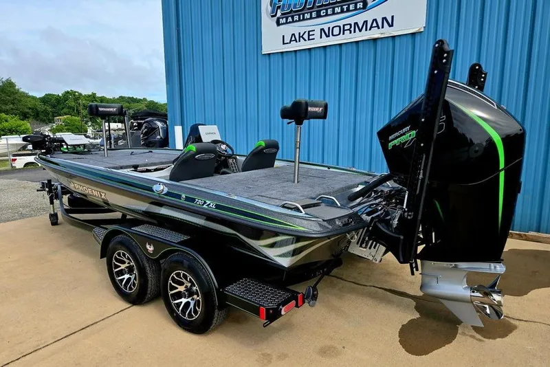 Slide: The Image of 2027 Phoenix 721 ZXL boat at Lake Norman Marine Center, featuring sleek design and powerful engine. - 4