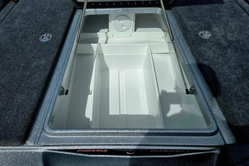 Slide: The Image of Open storage compartment of 2027 Phoenix 721 ZXL boat, featuring spacious interior design. - 31
