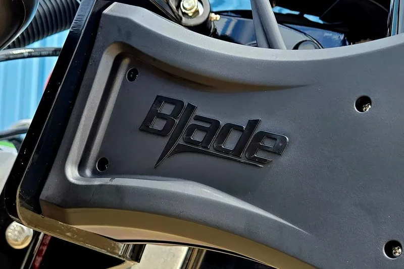 Slide: The Image of Close-up of Phoenix 721 ZXL 2027 with "Blade" logo on black surface. - 24