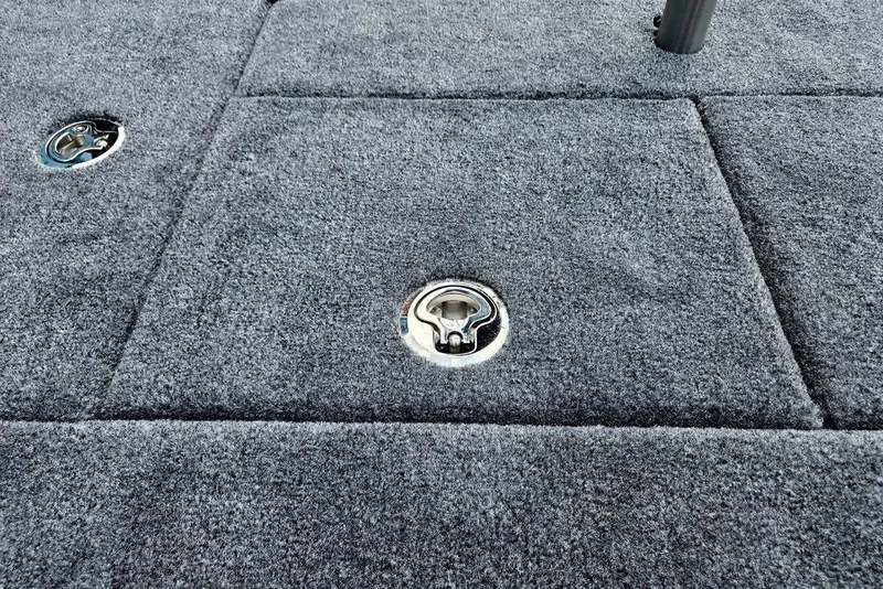 Slide: The Image of Gray carpeted deck of 2027 Phoenix 721 ZXL boat with metal latches. - 59