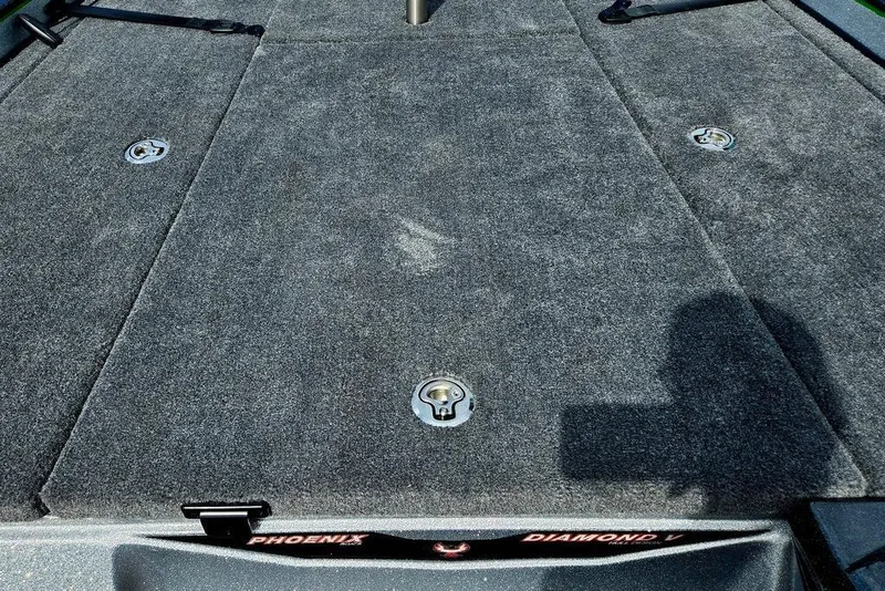 Slide: The Image of Carpeted deck of 2027 Phoenix 721 ZXL boat with storage compartments. - 30