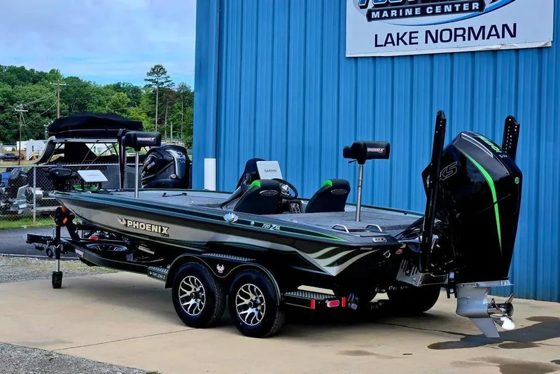 Slide: The Image of 2027 Phoenix 721 ZXL boat at Lake Norman Marine Center, featuring sleek design and powerful engine. - 5