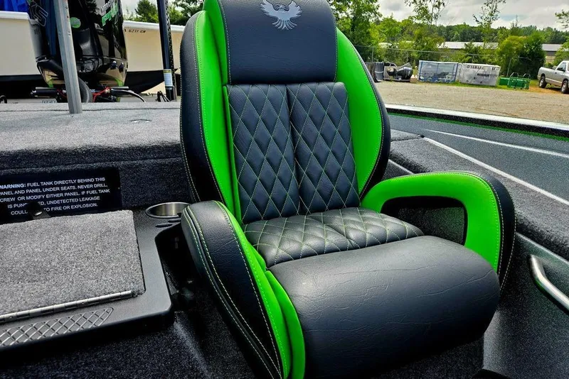 Slide: The Image of Luxurious black and green seat in 2027 Phoenix 721 ZXL boat, featuring diamond stitching. - 39