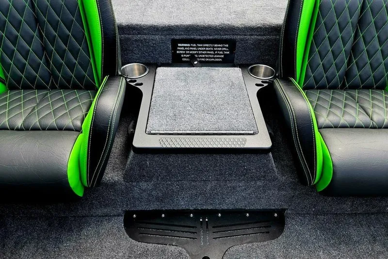 Slide: The Image of Interior of 2027 Phoenix 721 ZXL with green-accented seats and cup holders. - 76