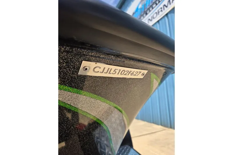 Slide: The Image of Close-up of 2027 Phoenix 721 ZXL boat hull with identification number. - 68