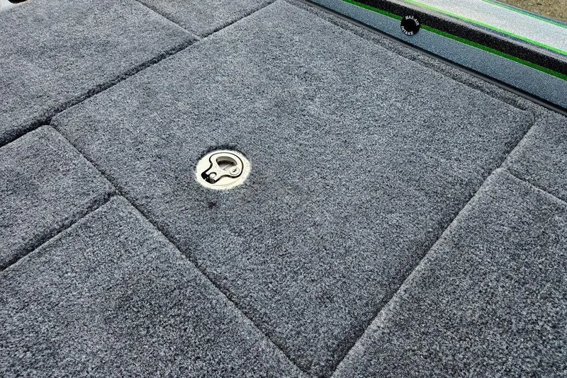 Slide: The Image of Carpeted deck of 2027 Phoenix 721 ZXL boat with metal latch. - 79