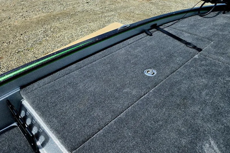 Slide: The Image of Carpeted deck of 2027 Phoenix 721 ZXL boat with storage compartment. - 28