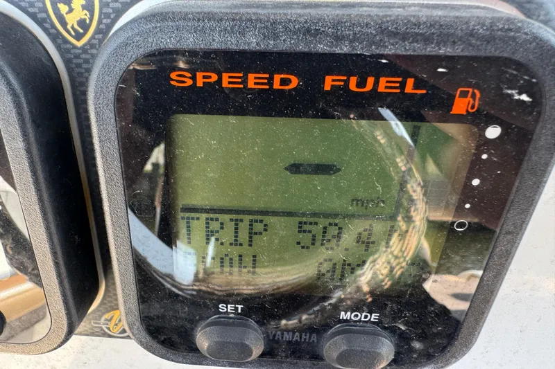 Slide: The Image of Close-up of a Yamaha speed and fuel gauge on a 2014 Century 2301 Center Console boat. - 2