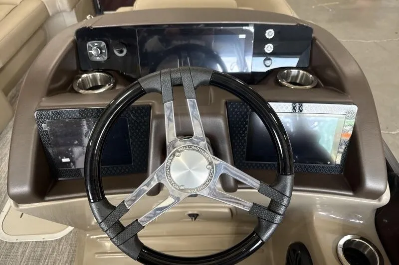Slide: The Image of Steering console of 2026 Bennington 24 LXS Quadbench with modern controls and displays. - 9