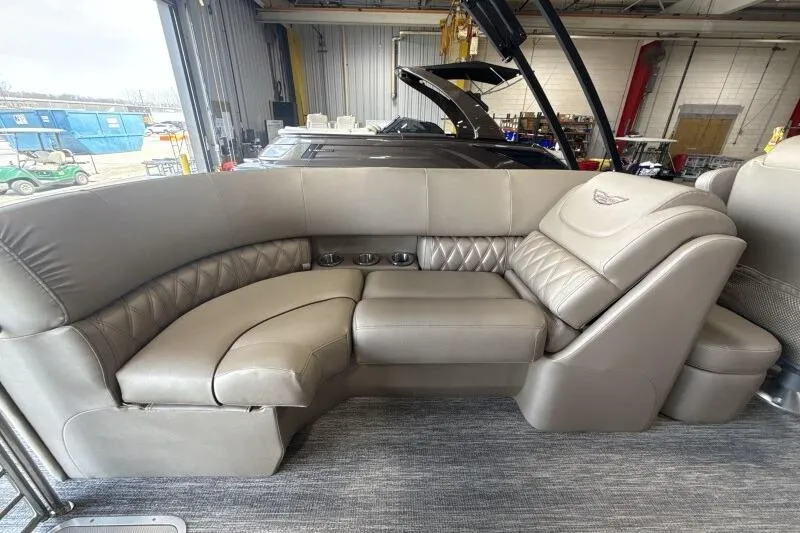 Slide: The Image of Luxurious seating on the 2026 Bennington 24 LXS Quadbench pontoon boat, featuring premium upholstery. - 8