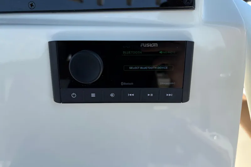 Slide: The Image of Fusion Bluetooth audio system on 2027 Pioneer 202 Islander boat dashboard. - 20