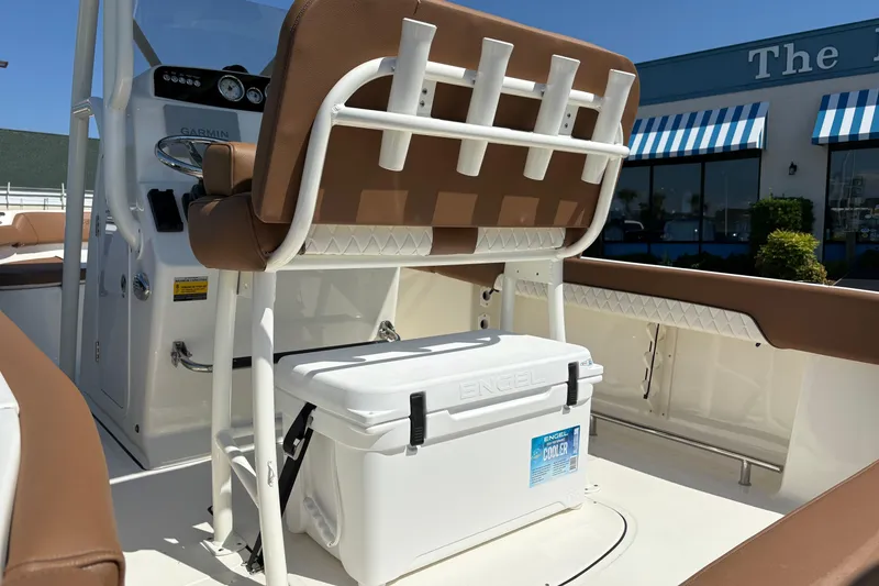 Slide: The Image of 2027 Pioneer 202 Islander boat interior with Engel cooler and Garmin dashboard. - 11