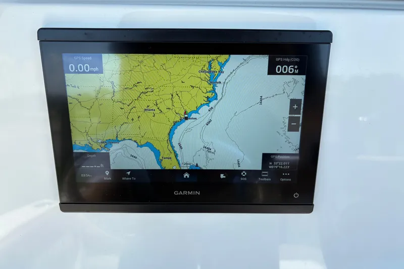 Slide: The Image of Garmin GPS display on Pioneer 2027 Islander boat showing navigation map and speed. - 19