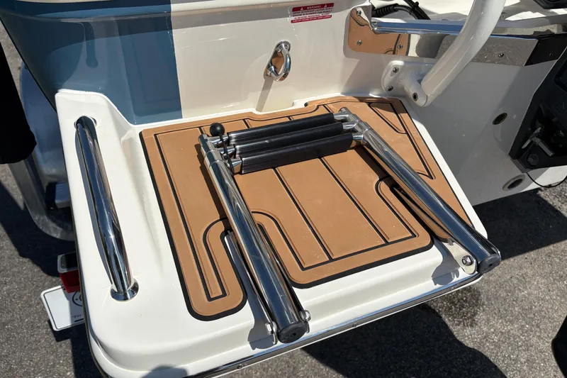 Slide: The Image of Swim platform with ladder on 2027 Pioneer 202 Islander boat. - 8