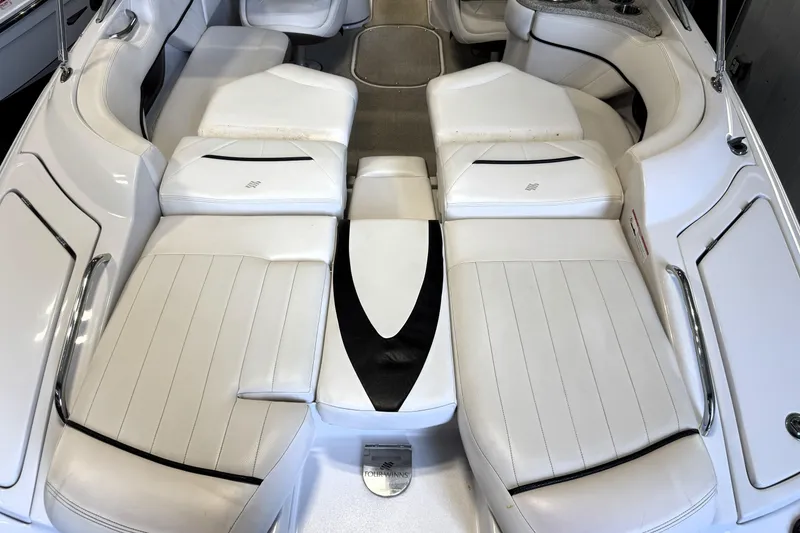 Slide: The Image of Interior of 2008 Four Winns H240 boat with white leather seating. - 26