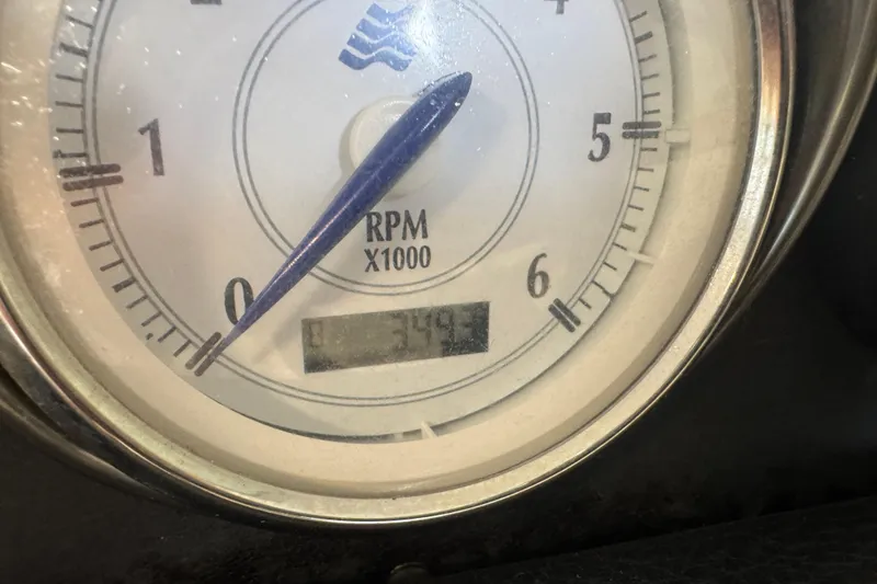 Slide: The Image of Close-up of a 2008 Four Winns H240 tachometer showing RPM gauge. - 22