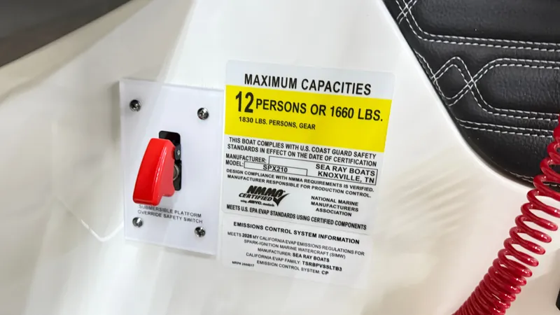 Slide: The Image of Safety label on a Sea Ray SPX 210 boat showing capacity details. - 42